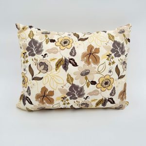 Floral gray and beige throw pillow handmade for elegantly decorating the sofa.