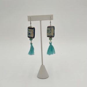 Sky blue tassel earrings with large blue and white jewelry bead