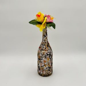 Brown multi color vase with traces of gray, orange and gold hand painted with yellow flowers.