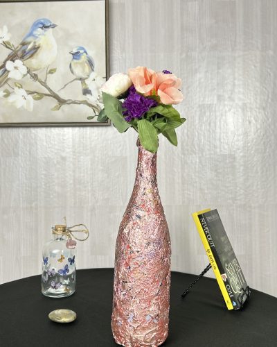 Hand painted red vase with purple and peach bouquet