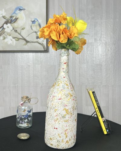 Hand painted cream vase with orange flower bouquet