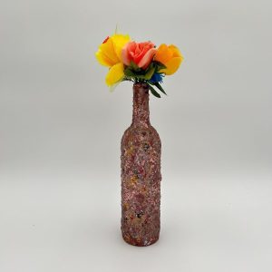 Soft pink flower vase hand painted with yellow flowers inside.