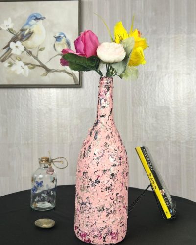 Hand painted candy pink vase with bright flowers inside