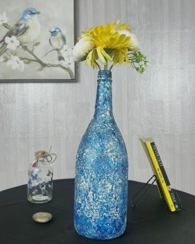 Hand painted royal blue vase with yellow and white flowers