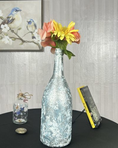 Hand painted light blue vase with yellow flowers