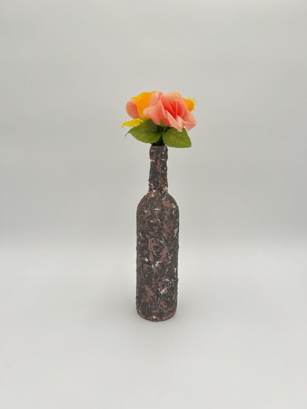 Brown vase with swivels of white hand painted with peach flower inside.