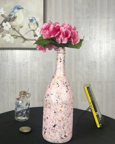Hand painted light pink vase with pretty pink flowers inside