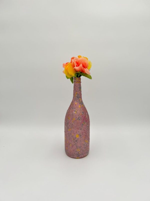 Glossy pink large decorative vase hand painted with colorful bouquet inside.