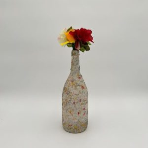 Sandy cream tan vase hand painted with red specks and flowers inside.