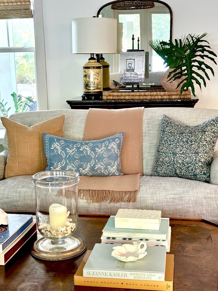 a fall decorated sofa with mix and match throw pillows