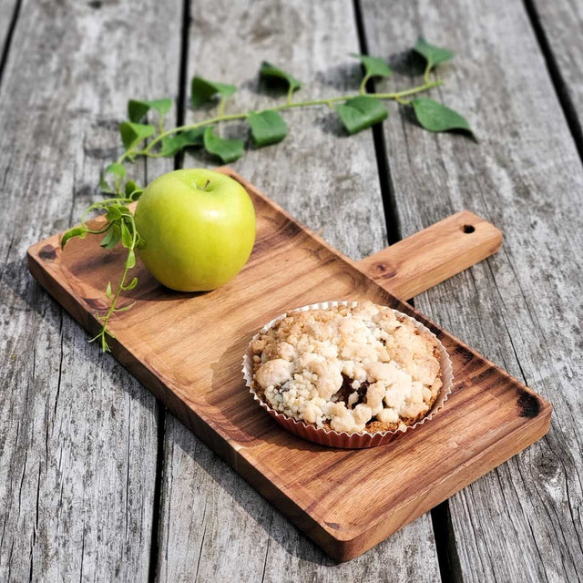 Wooden DIY serving tray with an apple and appetizer