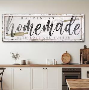 White and tan handmade home decor sign on wall in home