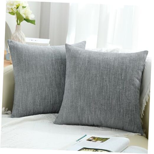 Solid tone gray decorative throw pillows on couch