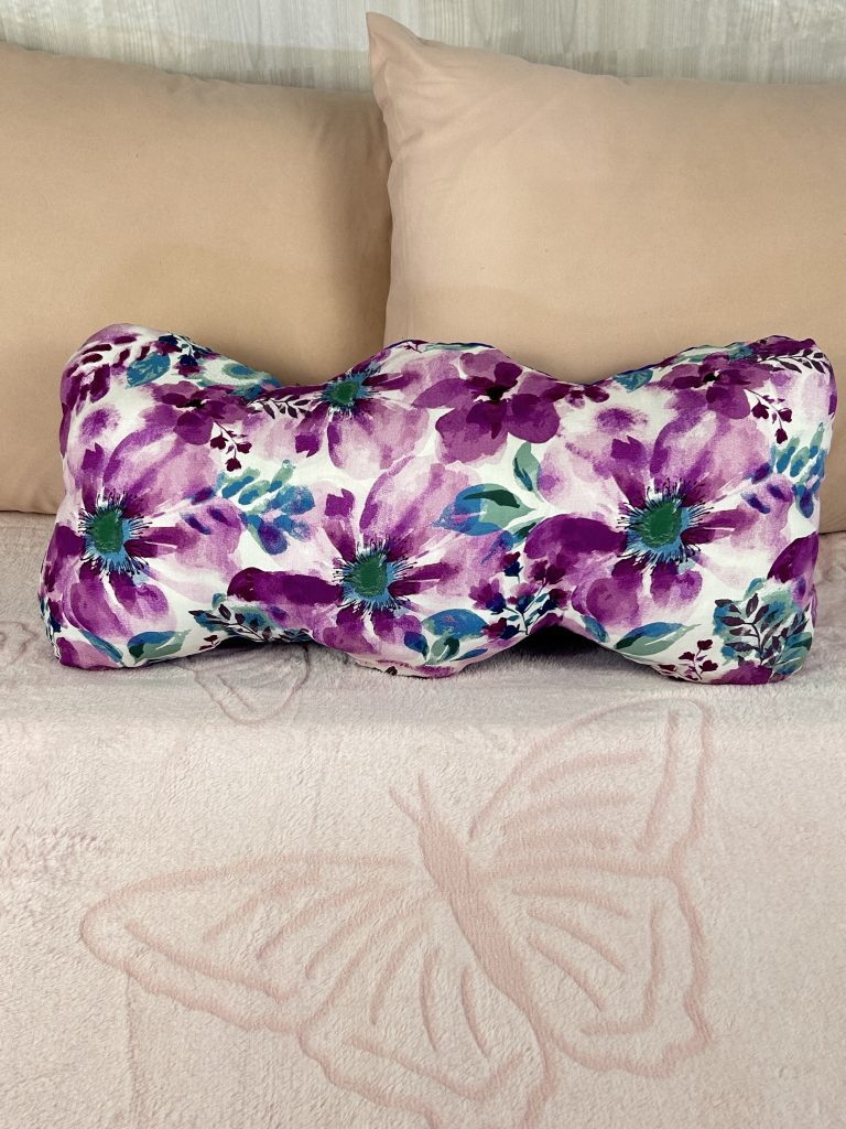 Floral print purple throw pillow for whimsical bedroom or living room decorating