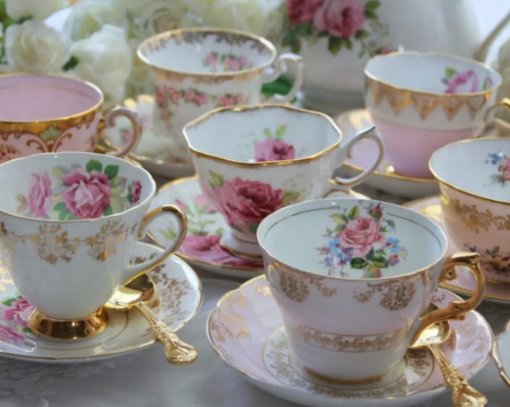 A beautiful, pink, white and gold vintage tea cup set 