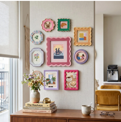 Colorful picture frames on wall for a whimsical home decor theme